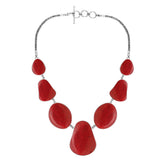 Women’s sterling silver necklace with teardrop coral stones and Bali-inspired accents.